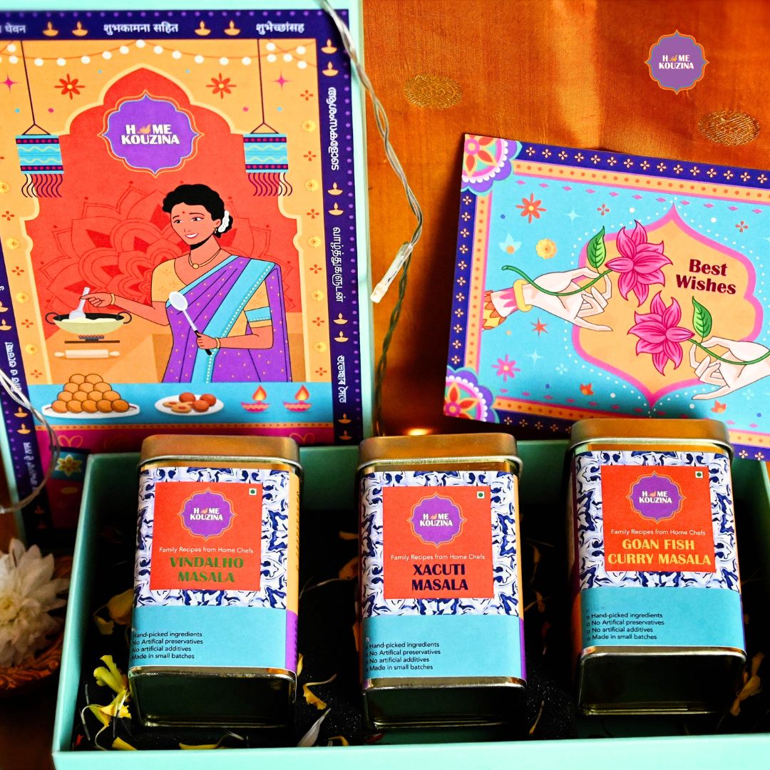 Top view of Goan festive gift pack featuring Vindalho, Xacuti, and Goan Fish Curry 150g tins in Gift Box