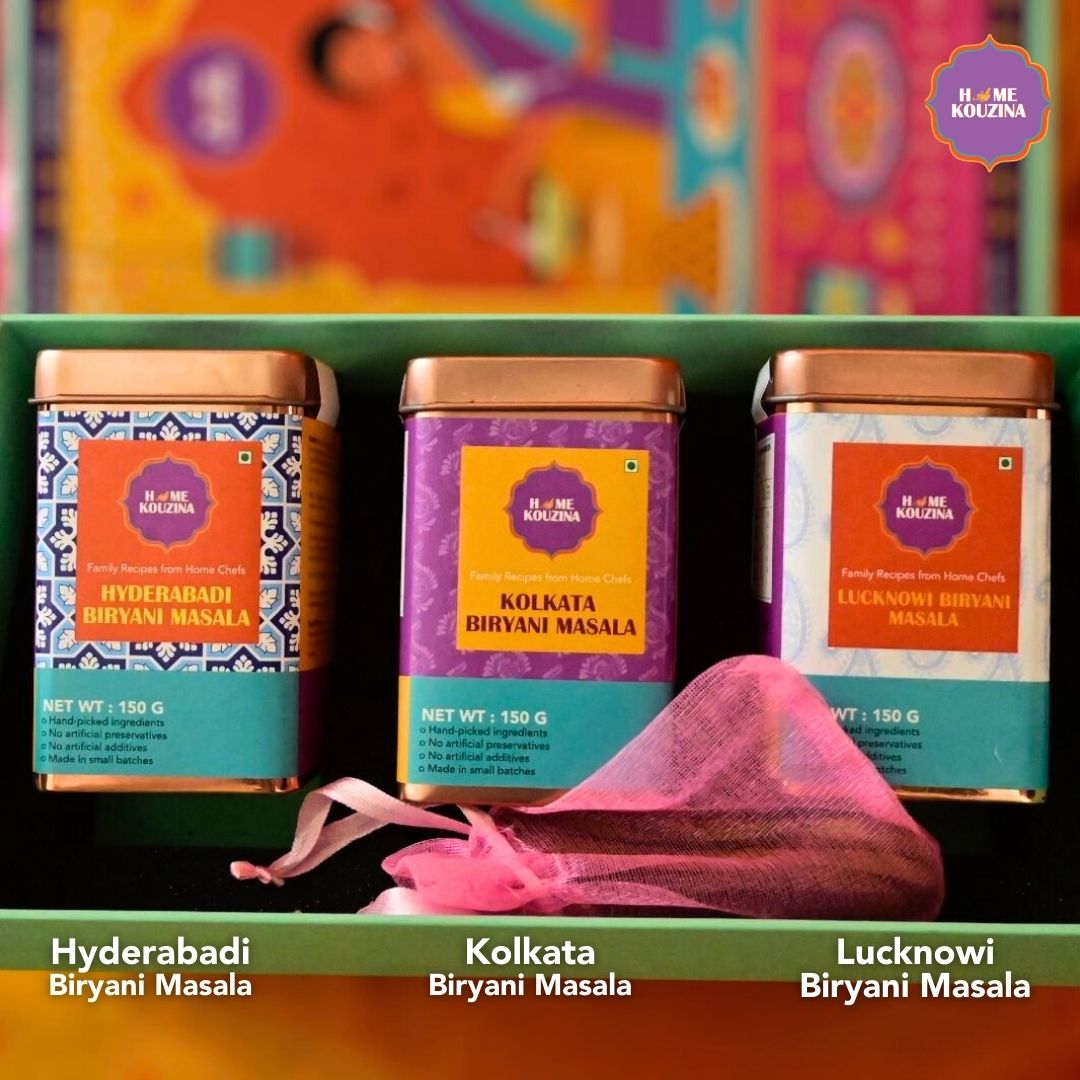 Front view of Home Kouzina Biryanis of India Premium Tin Pack – three authentic biryani masalas from Lucknow (Awadh), Hyderabad, and Kolkata – small-batch, preservative-free spice blend trio