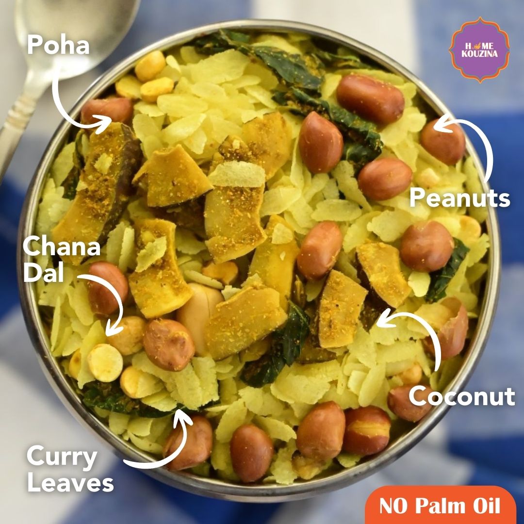 Top view of Home Kouzina's healthy Chiwda on a table with ingredients such as Poha, Peanuts, Chana Dal, Curry Leaves, and Coconut labels, NO Palm Oil