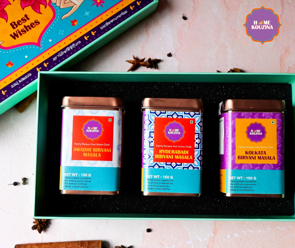 Top view of Home Kouzina Biryanis of India Premium Tin Pack – three authentic biryani masalas from Lucknow (Awadh), Hyderabad, and Kolkata – small-batch, preservative-free spice blend trio