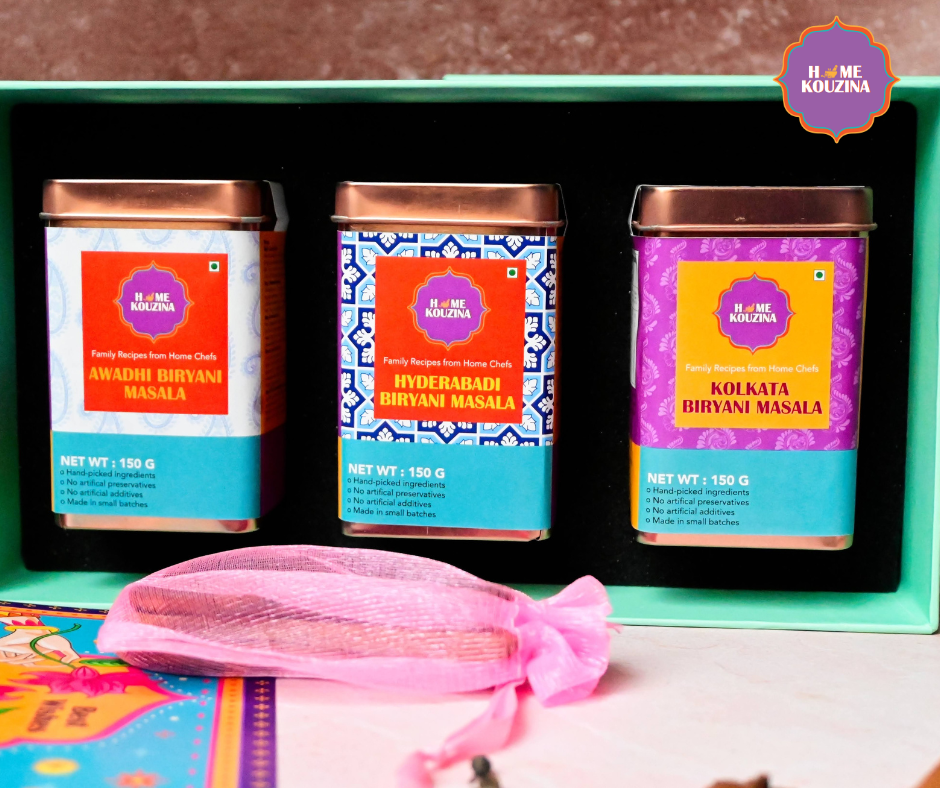 Festive Biryanis of India Premium Tin Pack with all three biryani masalas on festive table – perfect for cooking traditional biryanis and gifting gourmet Indian spices