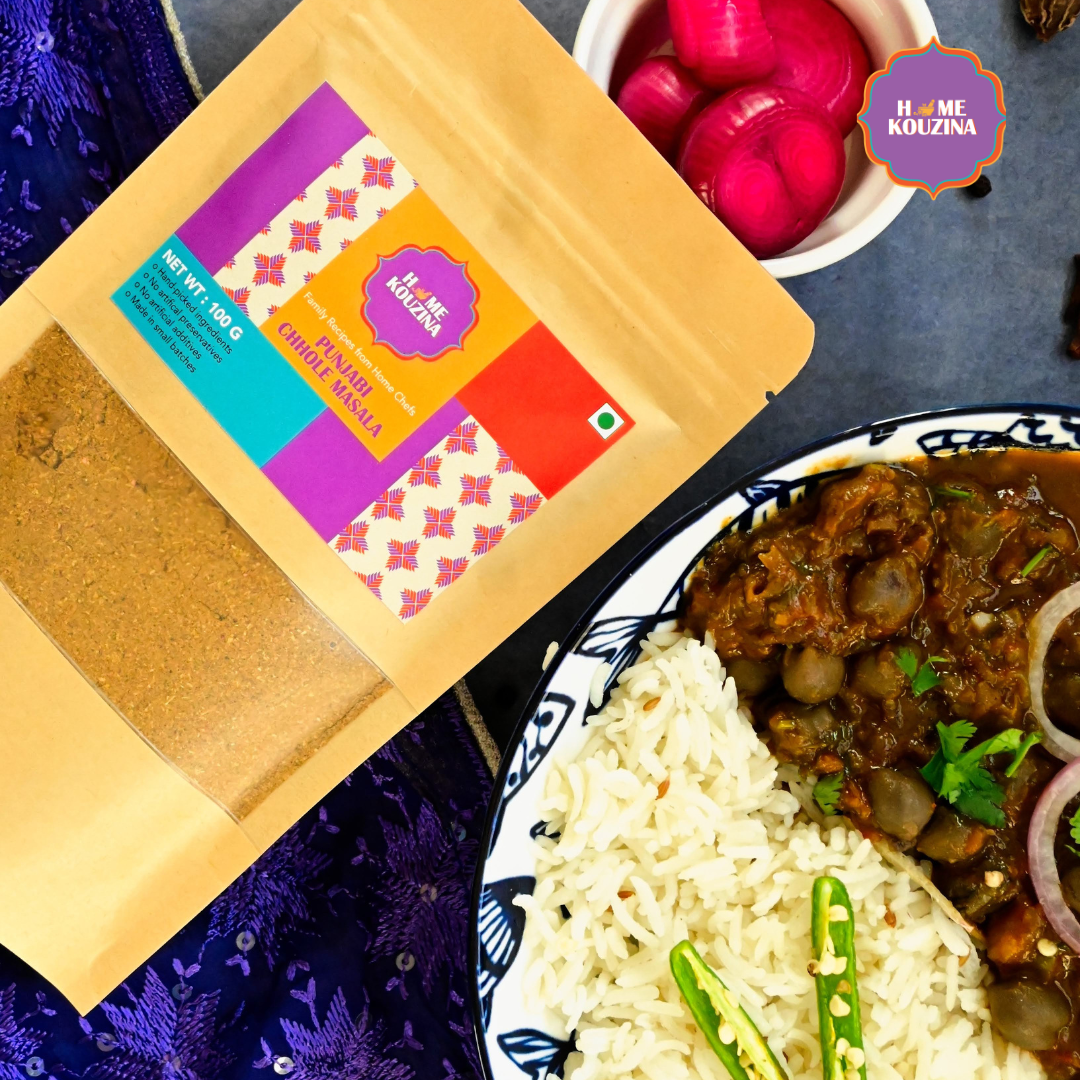 Home Kouzina 100g Punjabi Chhole pouch top view with bowl of prepared  Punjabi chhole – traditional North Indian curry masalas