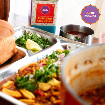  Traditional Misal Pav dish featuring Khandeshi Kala Masala and pav bread