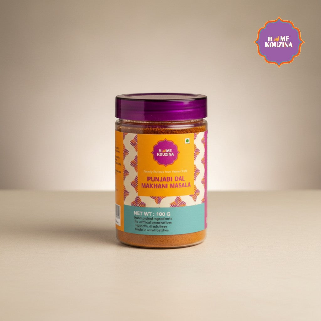 Jar of Punjabi Dal Makhani Masala with a purple lid on a beige background, featuring the Home Kouzina brand.